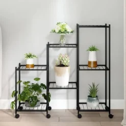 vidaXL Växtställ på hjul 83x25x83,5 cm svart järn